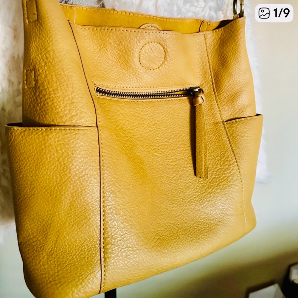 Mustard Yellow colored Vegan Leather Shoulder Bag. Includes pochette.